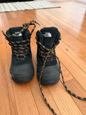 The North Face Black Boots with Yellow-Patterned Laces